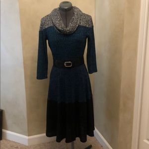 Dress with cowlick collar.